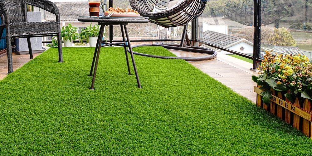 Artificial grass installation in a tidy urban garden